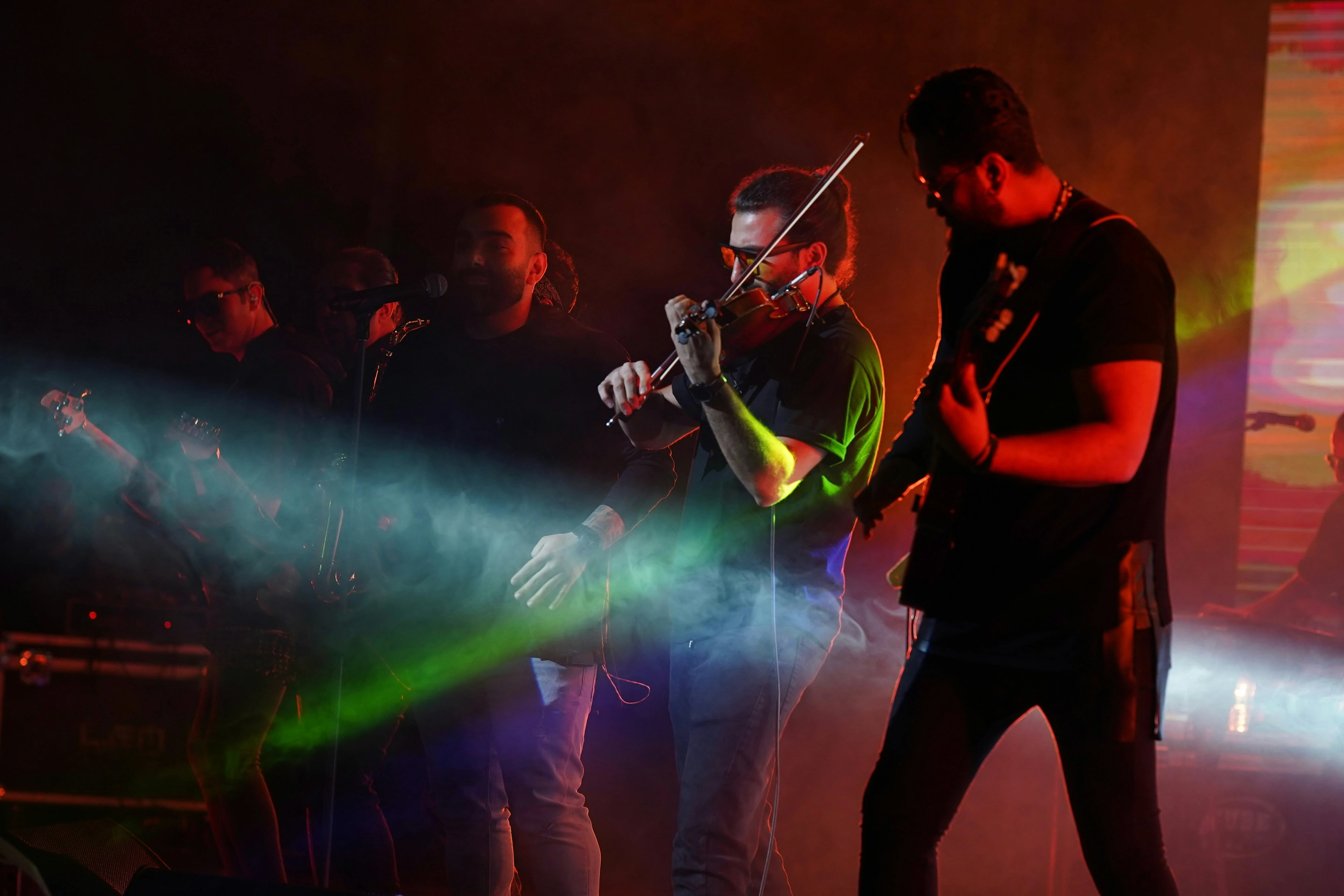 a group of people playing instruments